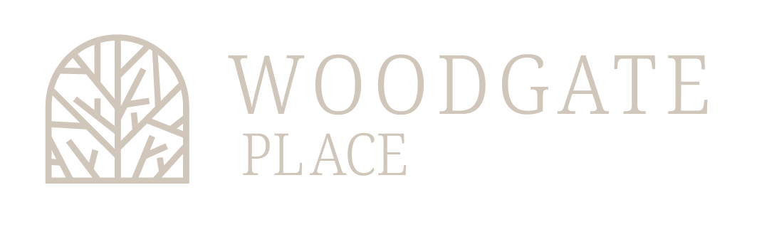 A black and white image of a tree design with the words
